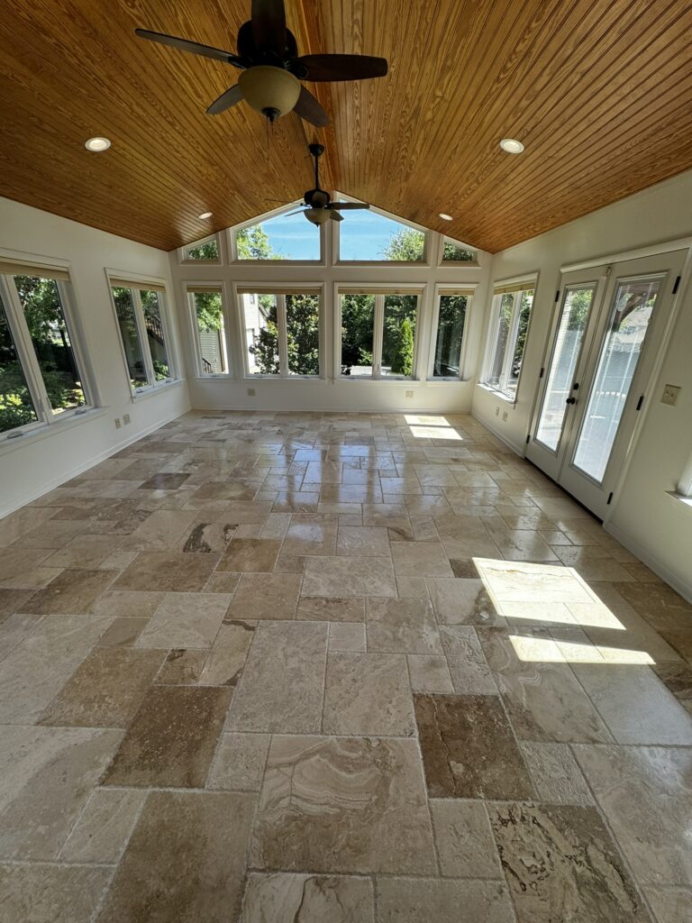 Sunroom with gleaming floors after expert residential cleaning service by DeJong Services LLC